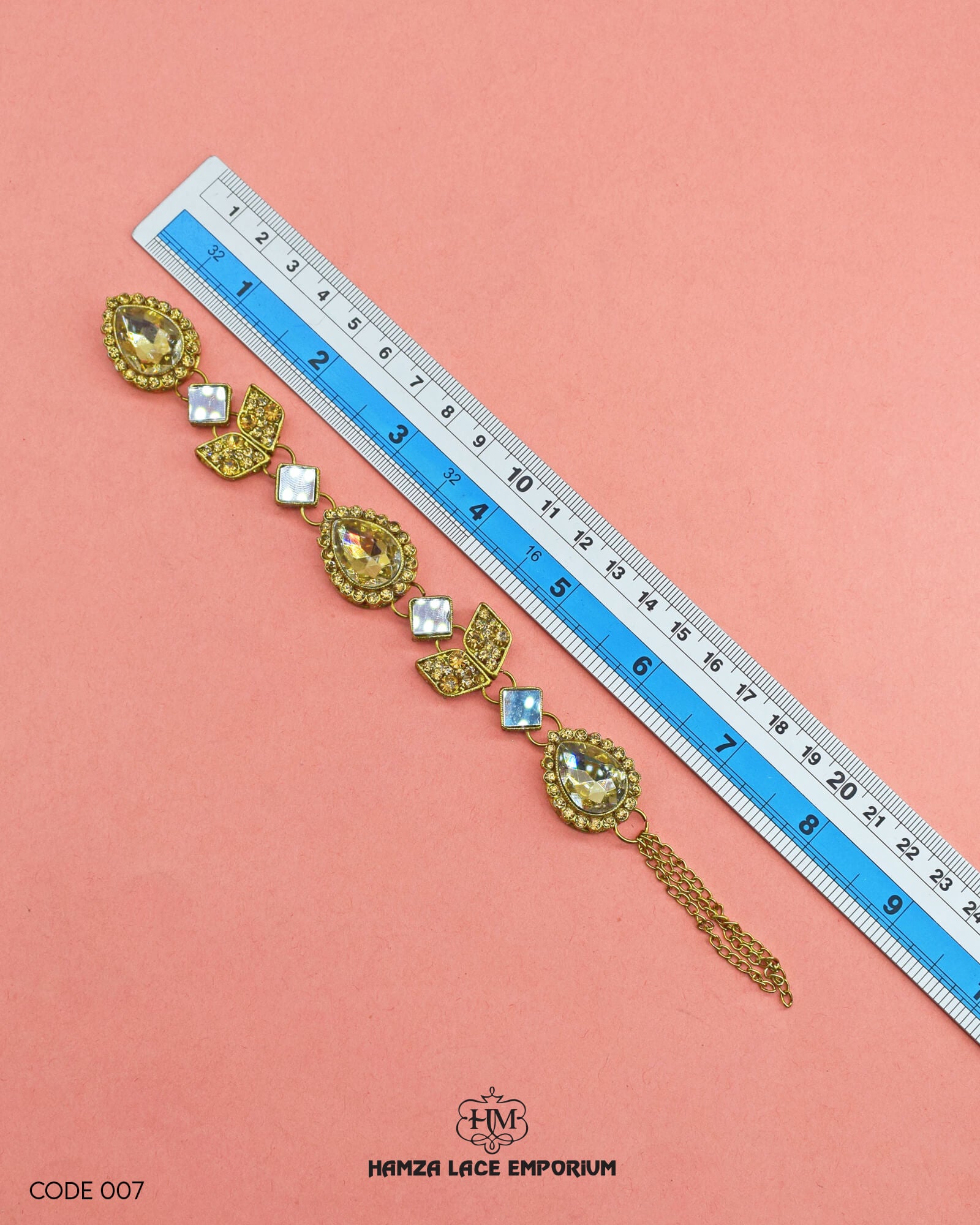 The 'Button Patti 007' size is showcased using a ruler for precise measurement.
