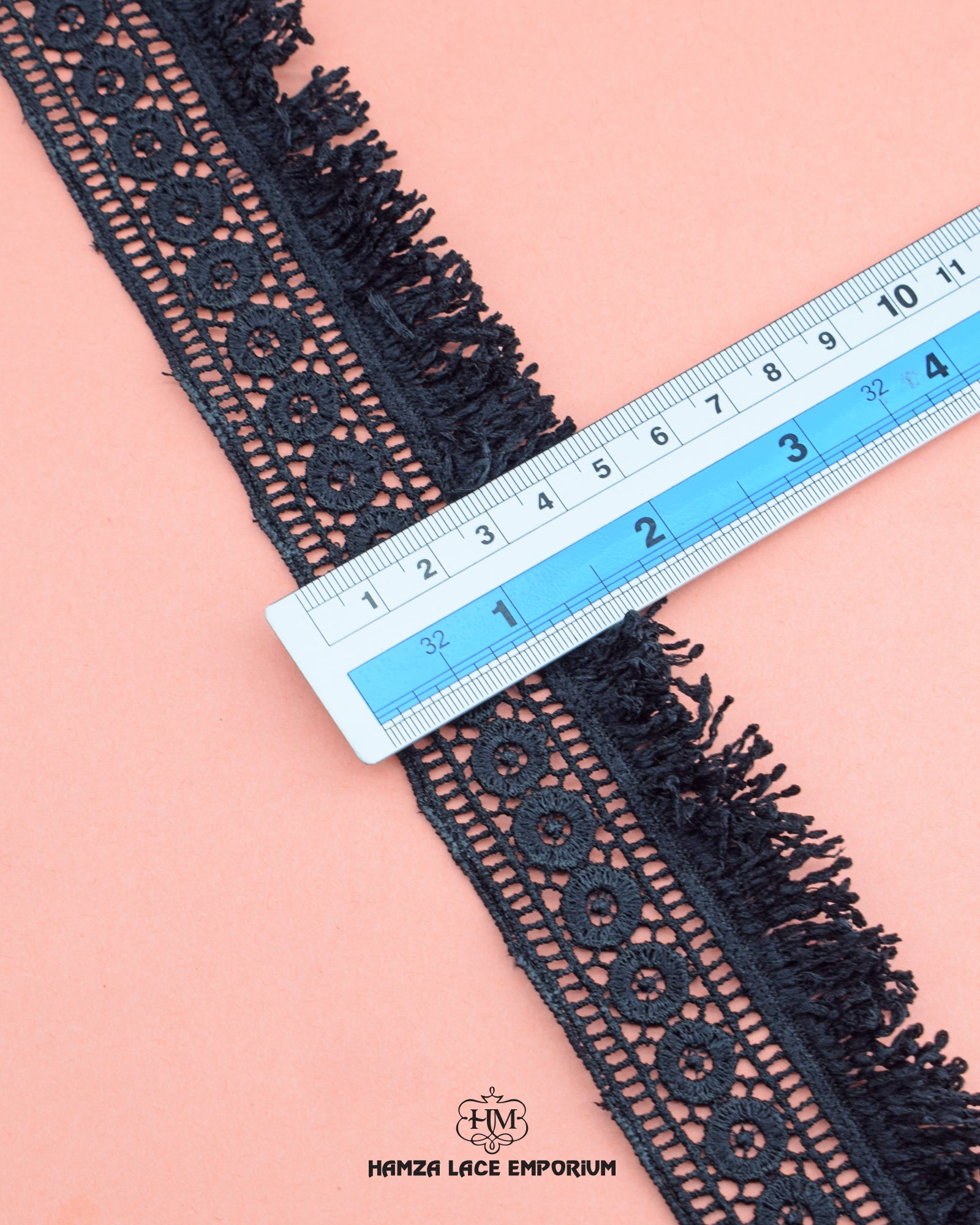 The size of the 'Edging Jhalar Lace 1209' is given with the help of a ruler.