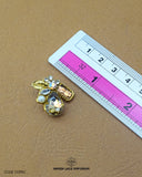 The size of the 'Fancy Button FBC133' is indicated using a ruler.