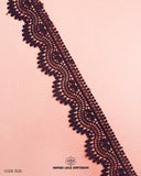 Black color 'Edging Scallop Lace' is on a pink  cloth