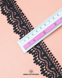 A scale is on the black 'Edging Lace 16167' for the measurement of its size which is 1.5 inches