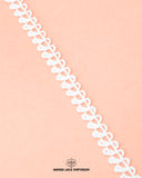 The white color 'Edging Loop Lace 17816' is on the pink piece of cloth