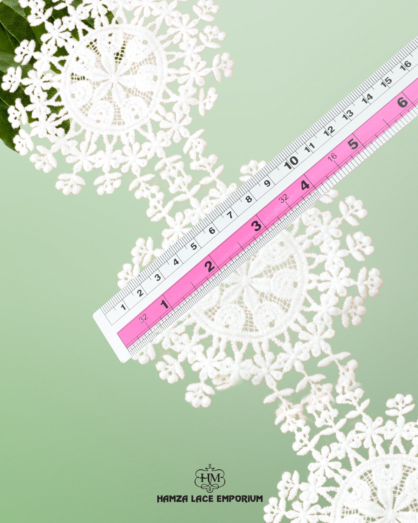 A ruler is on the 'Center Filling Lace 20831' measuring its size as  4.5 inches