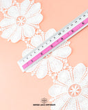 The size of the 'Center Flower Lace 21387' is given as '4' inches by placing a ruler on it