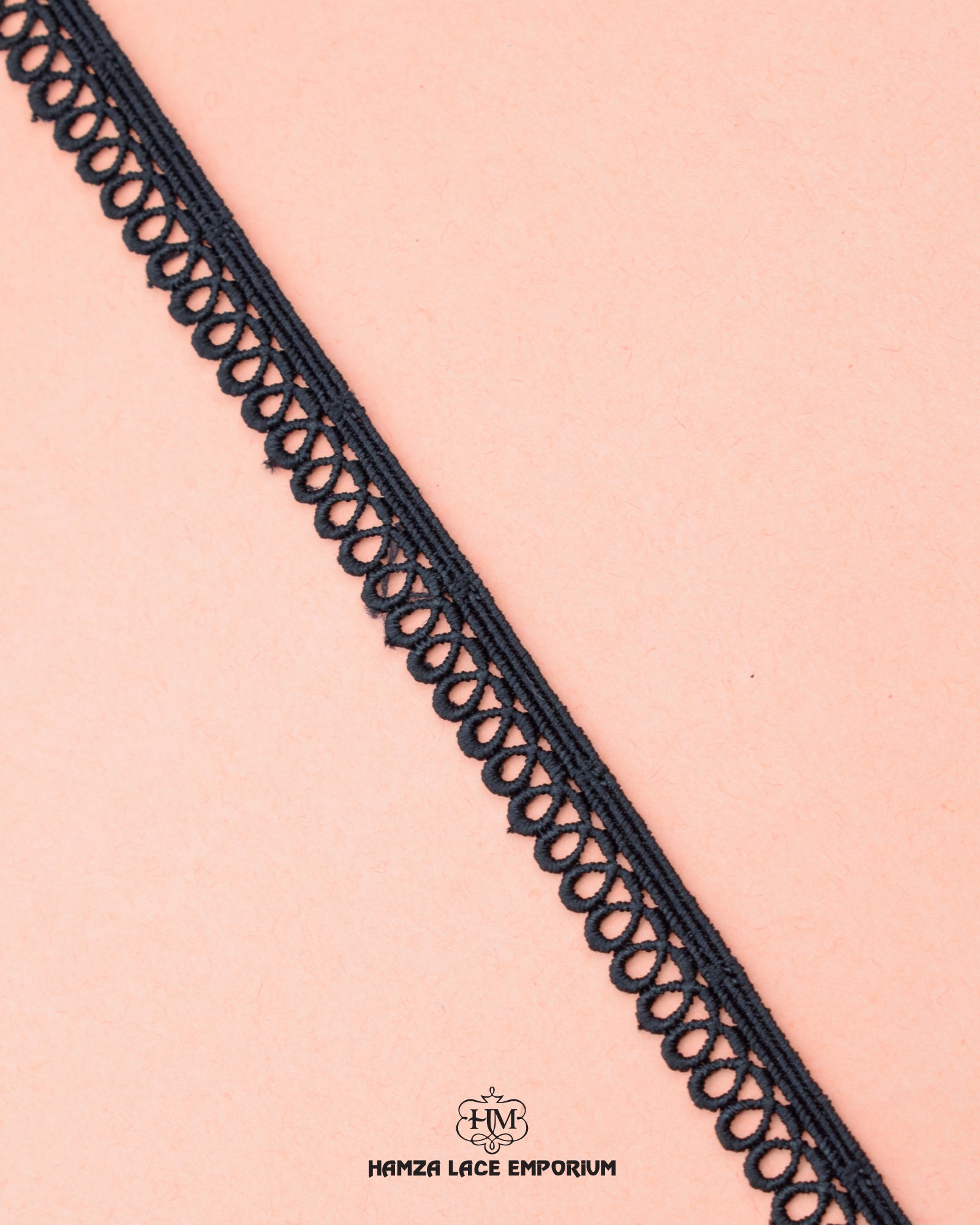 Zoomed view of the black 'Edging Loop Lace 2209' and the brand logo of hamza lace printed at the bottom