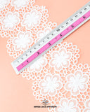 The size of the 'Center Flower Lace 23050' is given as '4' inches by placing a ruler on it