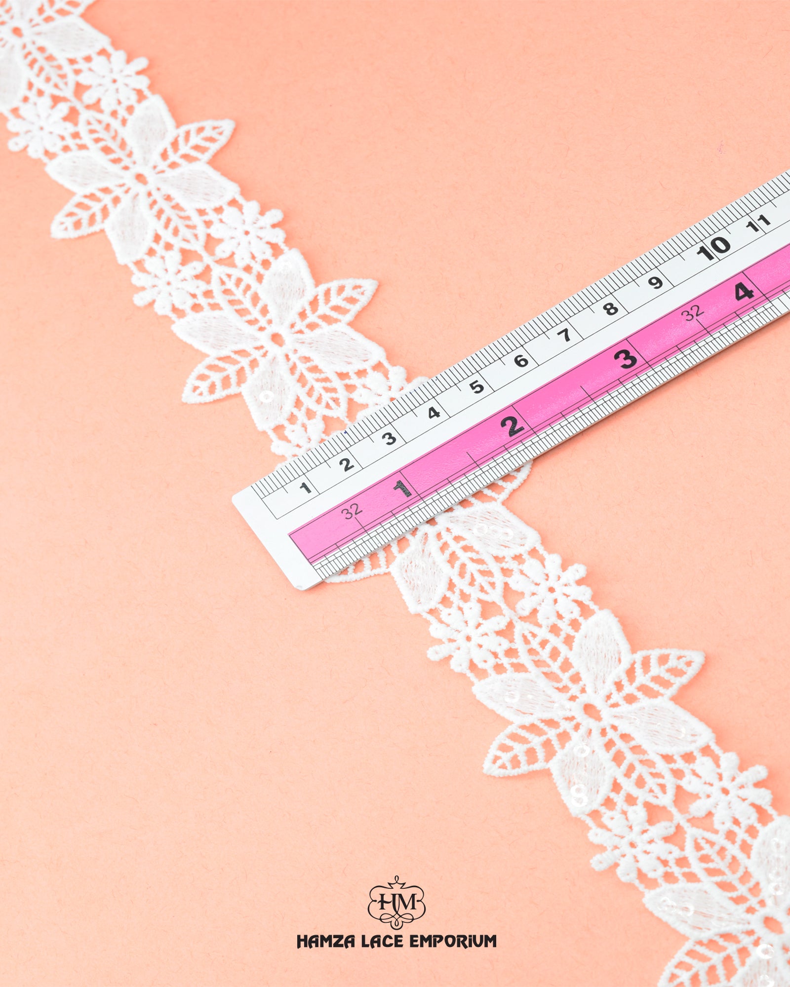 The size of the 'Center Flower Lace 23053' is given as '2' inches by placing a ruler on it