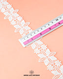 The size of the 'Center Flower Lace 23053' is given as '2' inches by placing a ruler on it