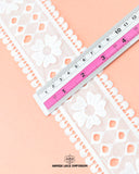 Center Filling Lace 23118 showcased alongside a ruler, revealing a width of 2.5 inches.