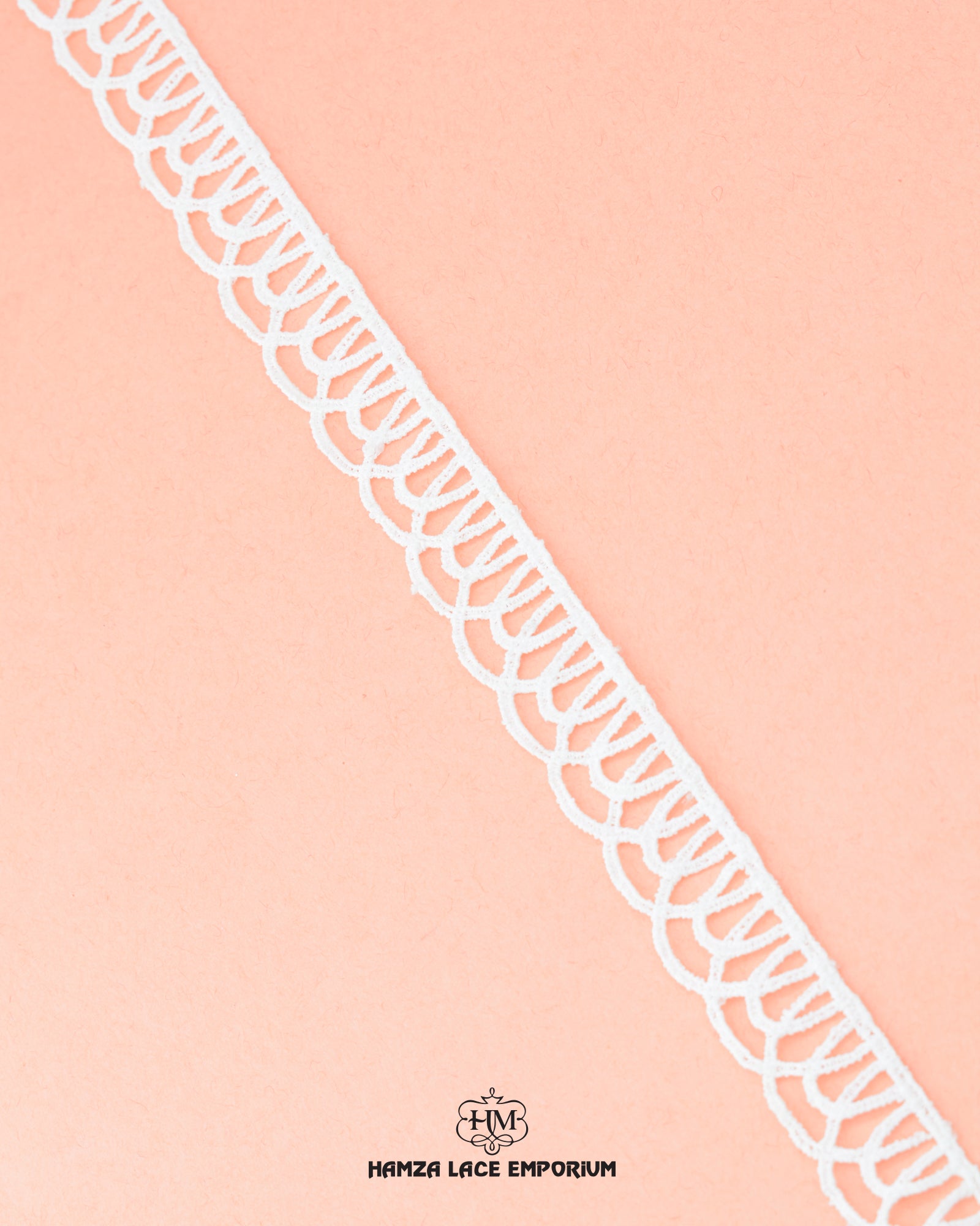 A white piece of 'Edging Scallop Lace 23135' is on a pink background and the brand name 'Hamza lace' at the bottom