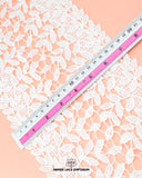 Center Filling Lace 23300 showcased alongside a ruler, revealing a width of seven inches.