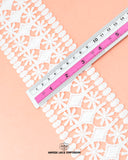 Center Filling Lace 23446 showcased alongside a ruler, revealing a width of 3.25 inches.