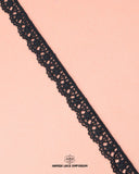Zoomed view of the black 'Edging Scallop Lace 23485' and the brand logo at the bottom