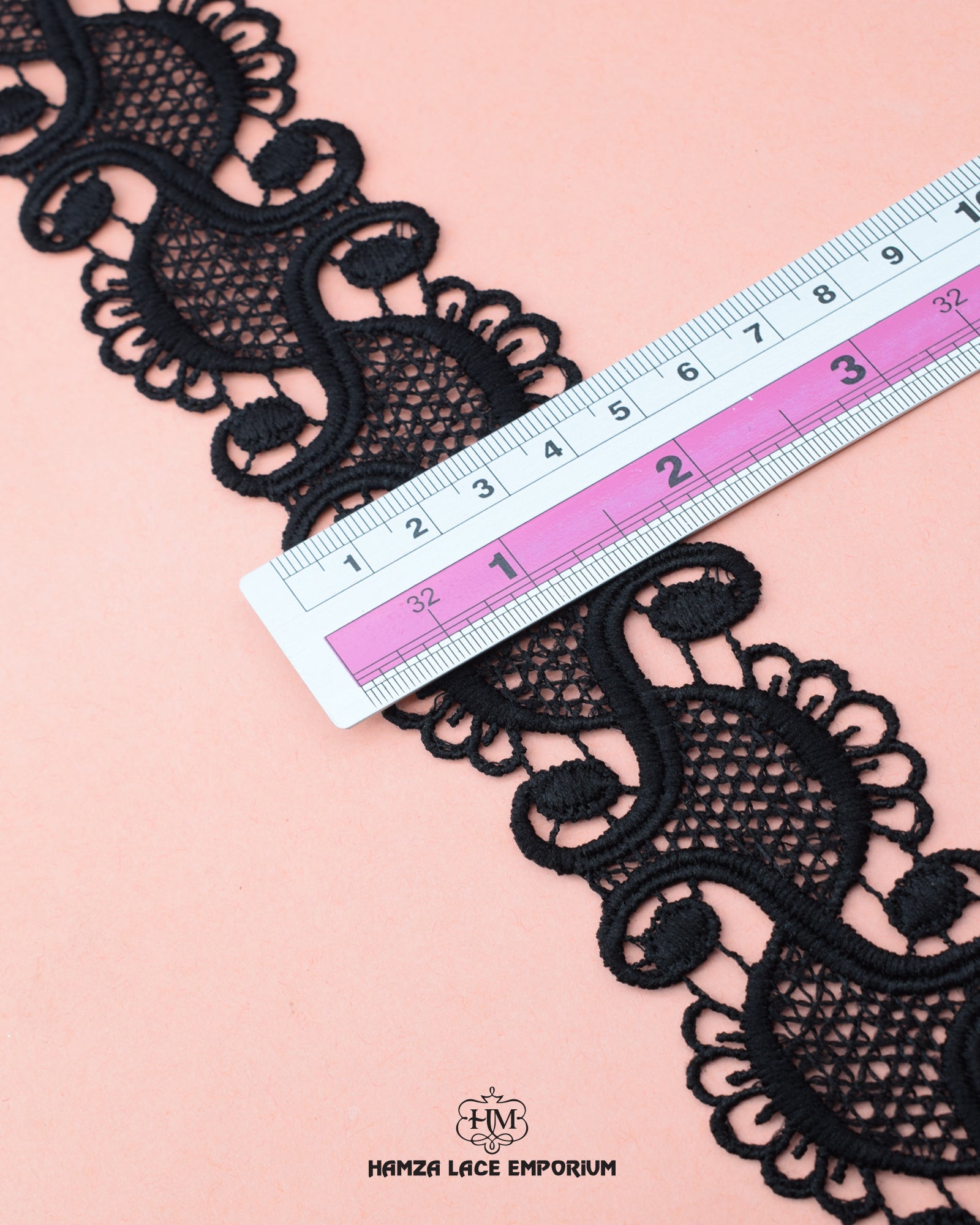 Center Filling Lace 23635 showcased alongside a ruler, revealing a width of one inch.