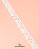 The 'Edging Flower Lace 2423'  is placed on a pink background