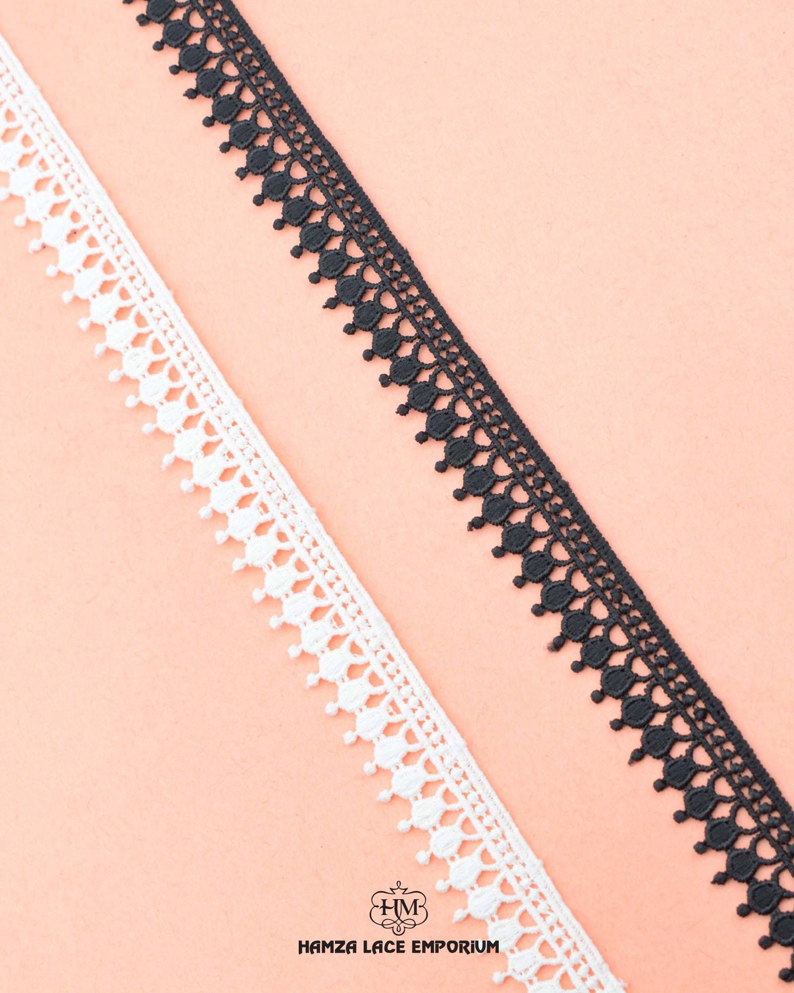 two 'Edging Loop Lace 21962' is placed side by side on a pink peace of fiber with the brand name 'Hamza Lace' at the bottom
