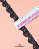 A ruler is on the black color 'Edging Scallop Lace 2512' measuring its size as 0.75 inch