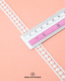 A scale is placed on the 'Center Filling Lace 4383' for the purpose to show its size that is 0.5 inches