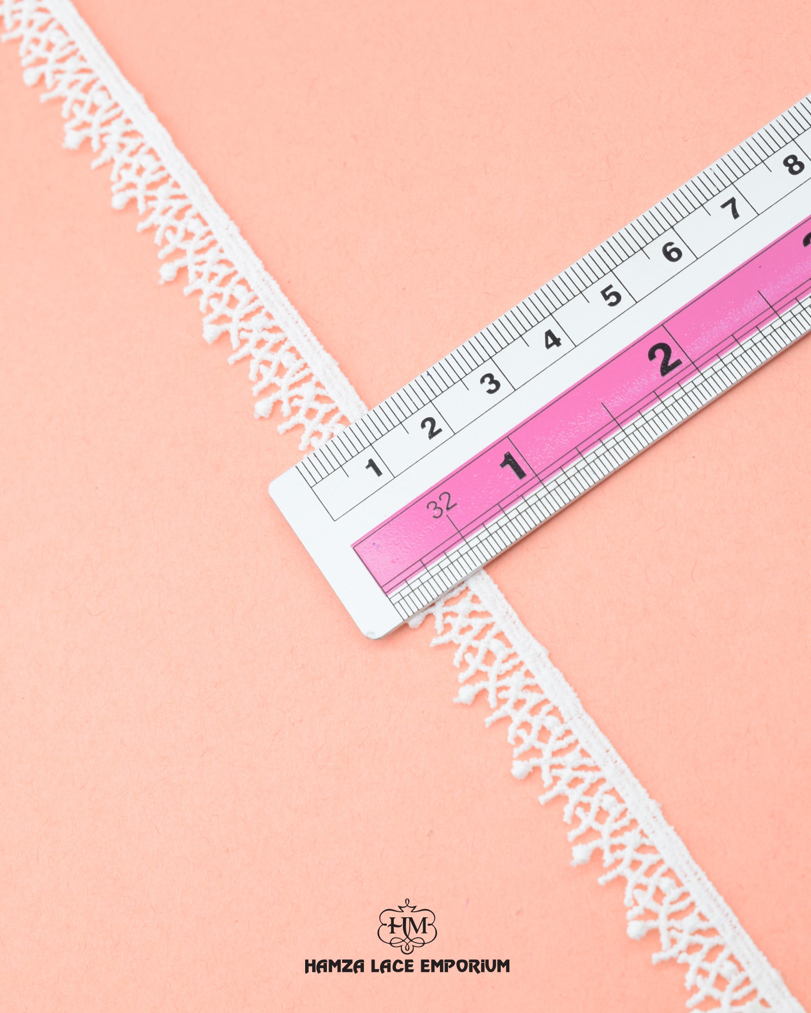 A scale is placed on the 'Edging Lace 5286' for the purpose to show its size that is 0.5 inches