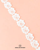 A white piece of the 'Center Flower Lace 5500' on a pink background and the 'Hamza Lace' sign and logo at the bottom is written with black color color