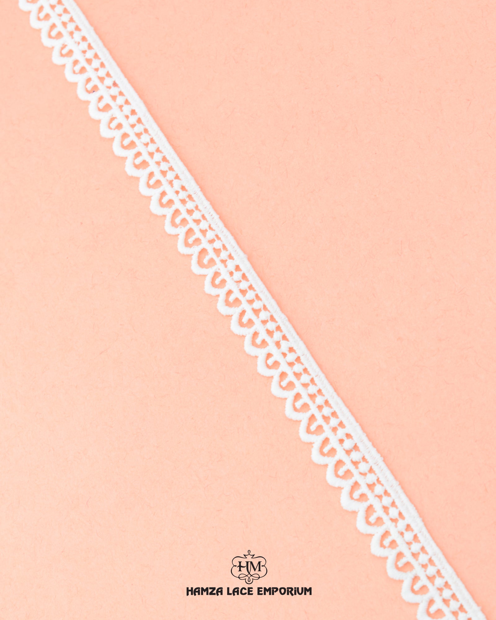 The Edging Scallop Lace 5934 is on a pink piece of cloth with the sign "Hamza Lace'
