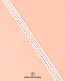 The Edging Scallop Lace 5934 is on a pink piece of cloth with the sign "Hamza Lace'