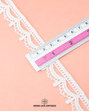 A Ruler is mearing the size of the 'Edging Scallop Lace 6093' and showing as 1 inch