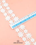 The size of the 'Center Flower Lace 70704' is given as '2' inches by placing a ruler on it