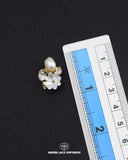 The size of the 'Hanging Flower Stone With Pearl Button FBC019' is indicated using a ruler.