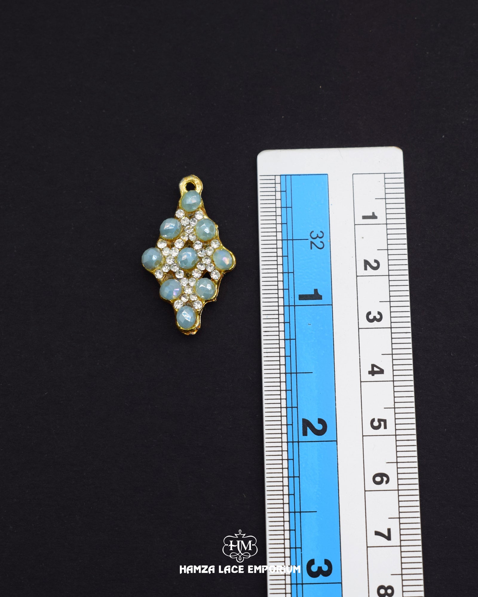 Elegant 'Kite Shape Button FBC09' for Clothing (Size shown with ruler)