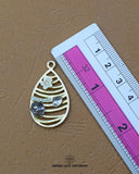 'Hanging Droop Shape Button 20FBC' with a ruler placed alongside it to showcase the size.