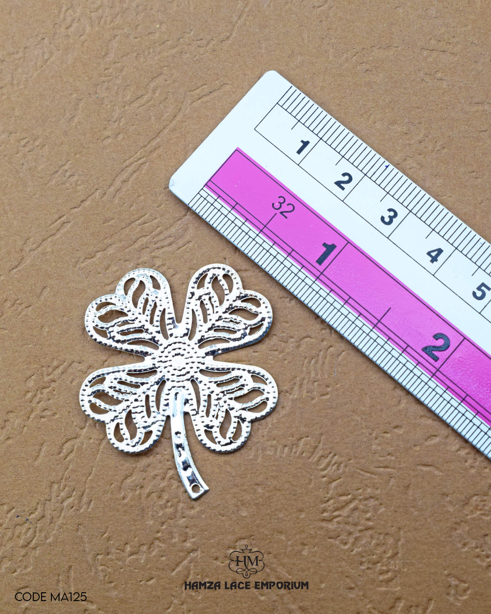 Elegant 'Flower Design Metal Accessory MA125' for Clothing (Size shown with ruler)