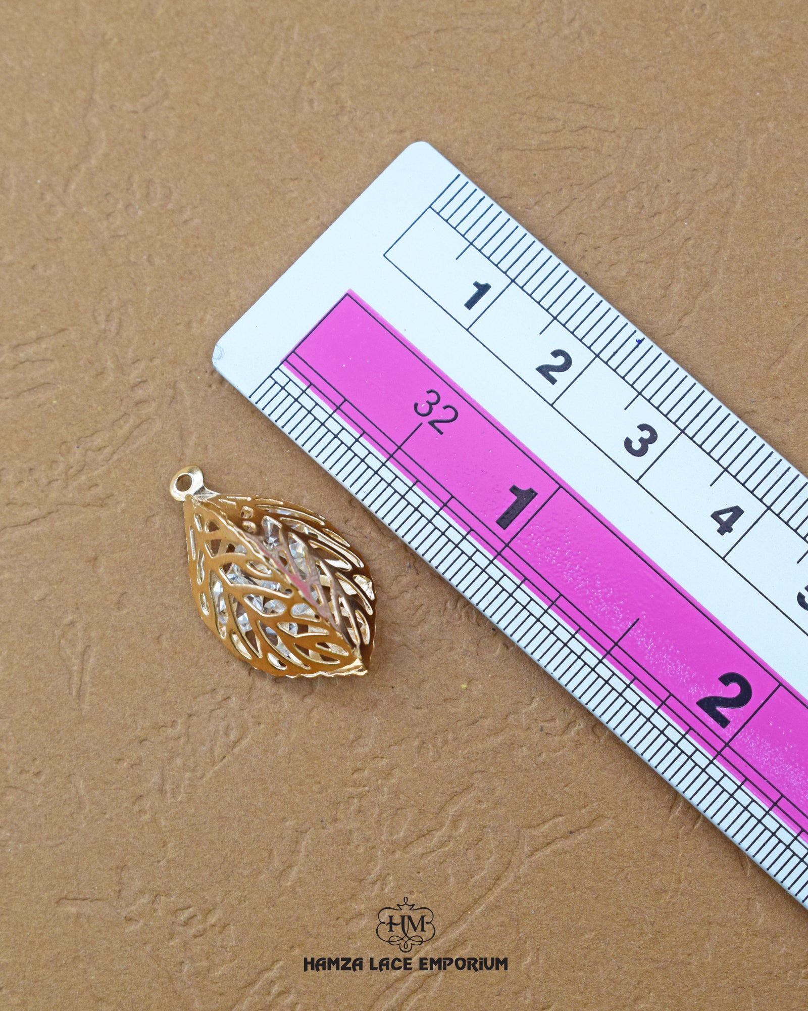 The size of the 'Leaf Design Metal Accessory MA256' is indicated using a ruler.