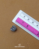 The size of the Beautifully designed 'Butterfly Design Button MA314' is measured by using a ruler