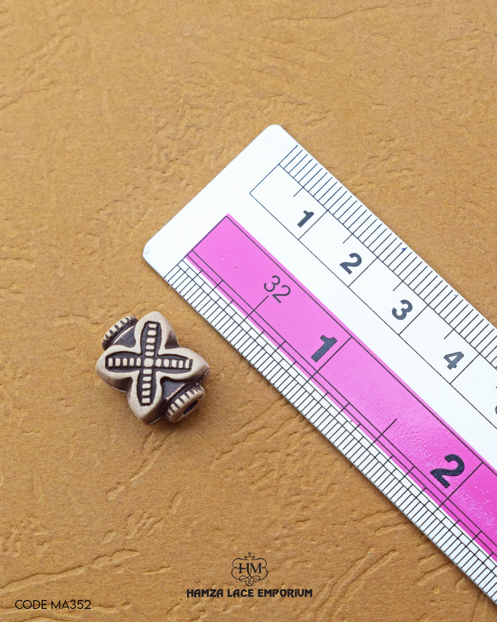 Size of the 'Cross Design Button MA352' is shown with a ruler