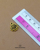 Elegant 'Flower design Metal Button MA520' for Clothing (Size shown with ruler)