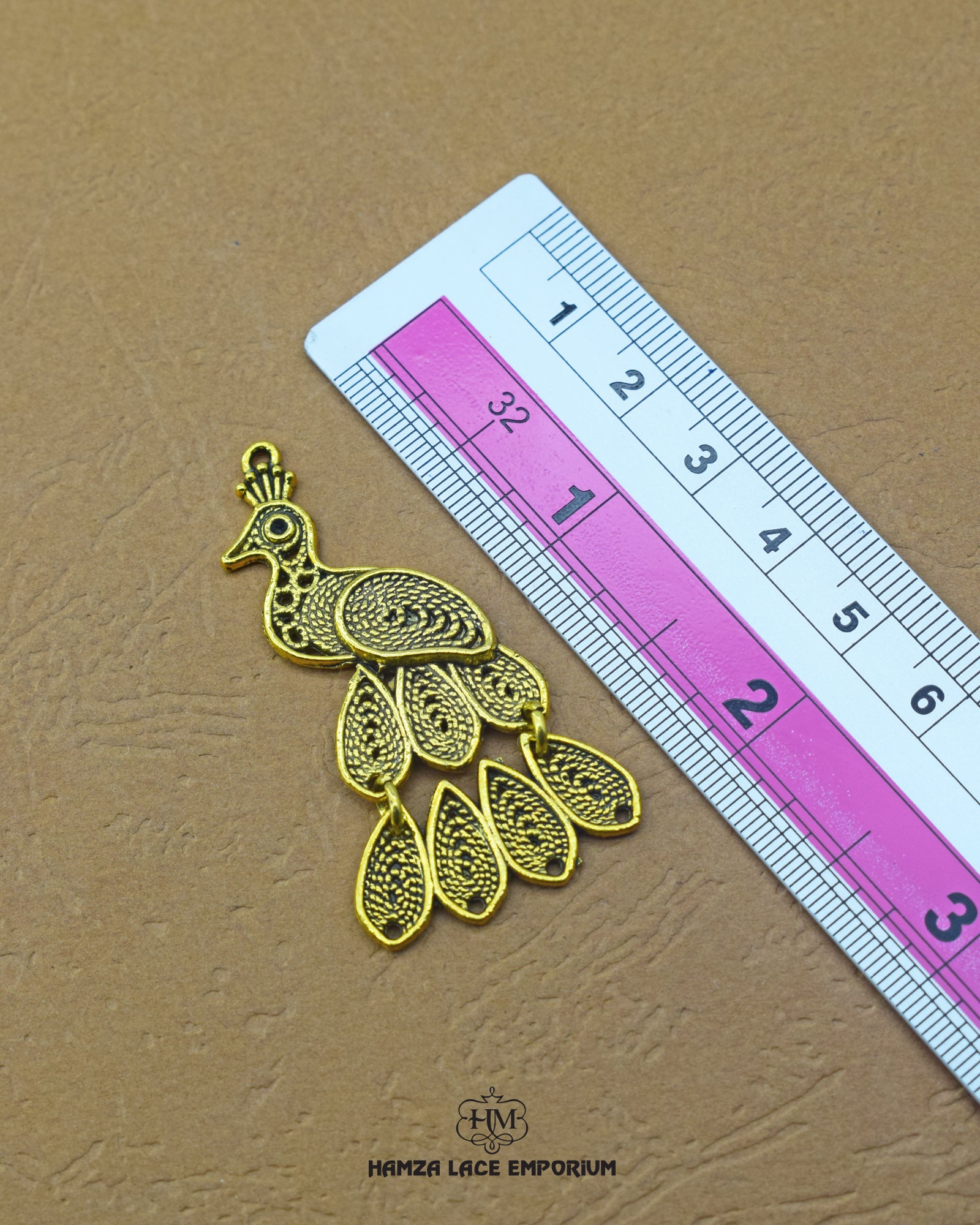 The size of the 'Peacock Design Button MA539' is indicated using a ruler.