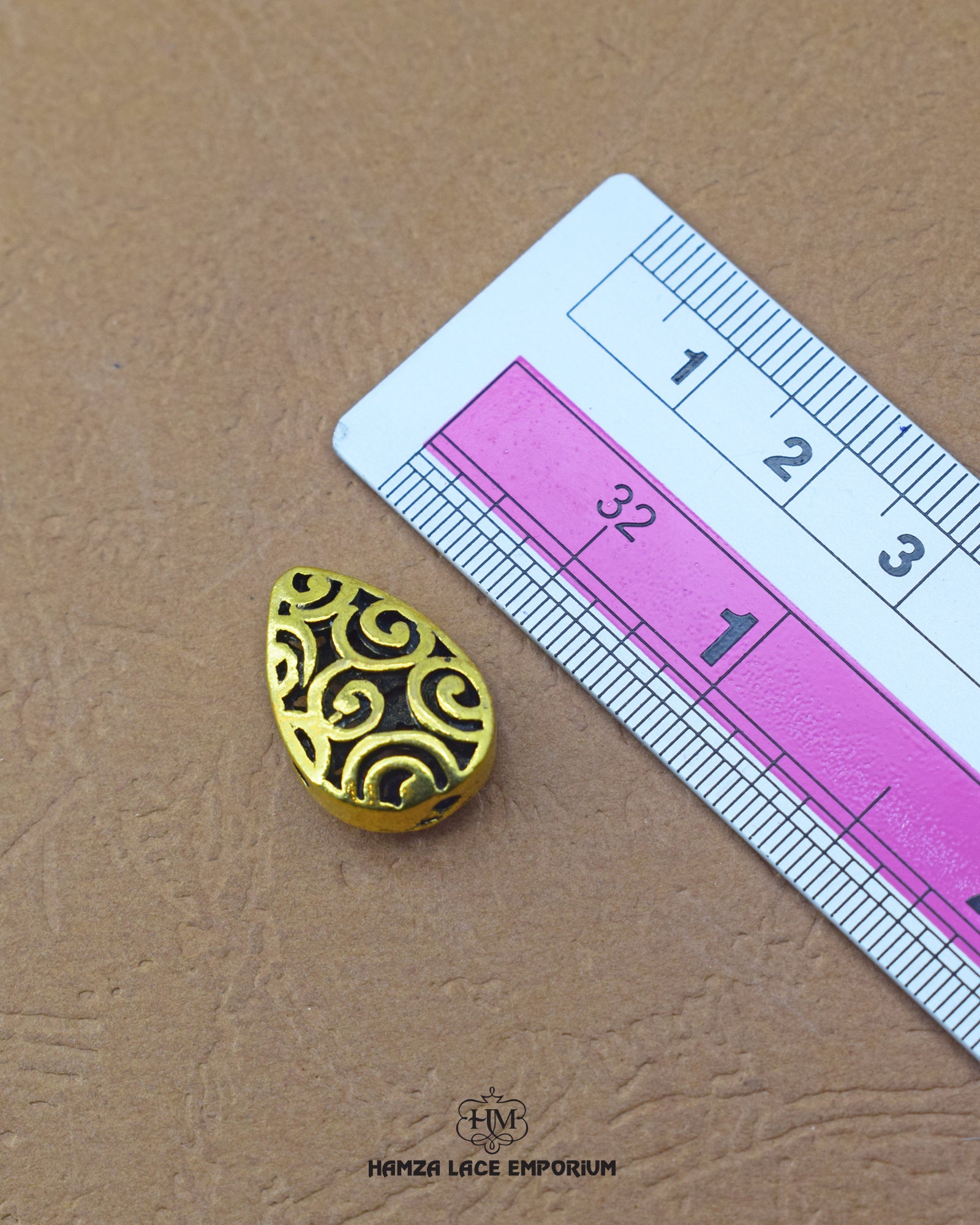 Elegant 'Drop Shape Button MA541' for Clothing (Size shown with ruler)