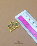 The size of the 'Sewing Machine Design Button MA555' is indicated using a ruler.