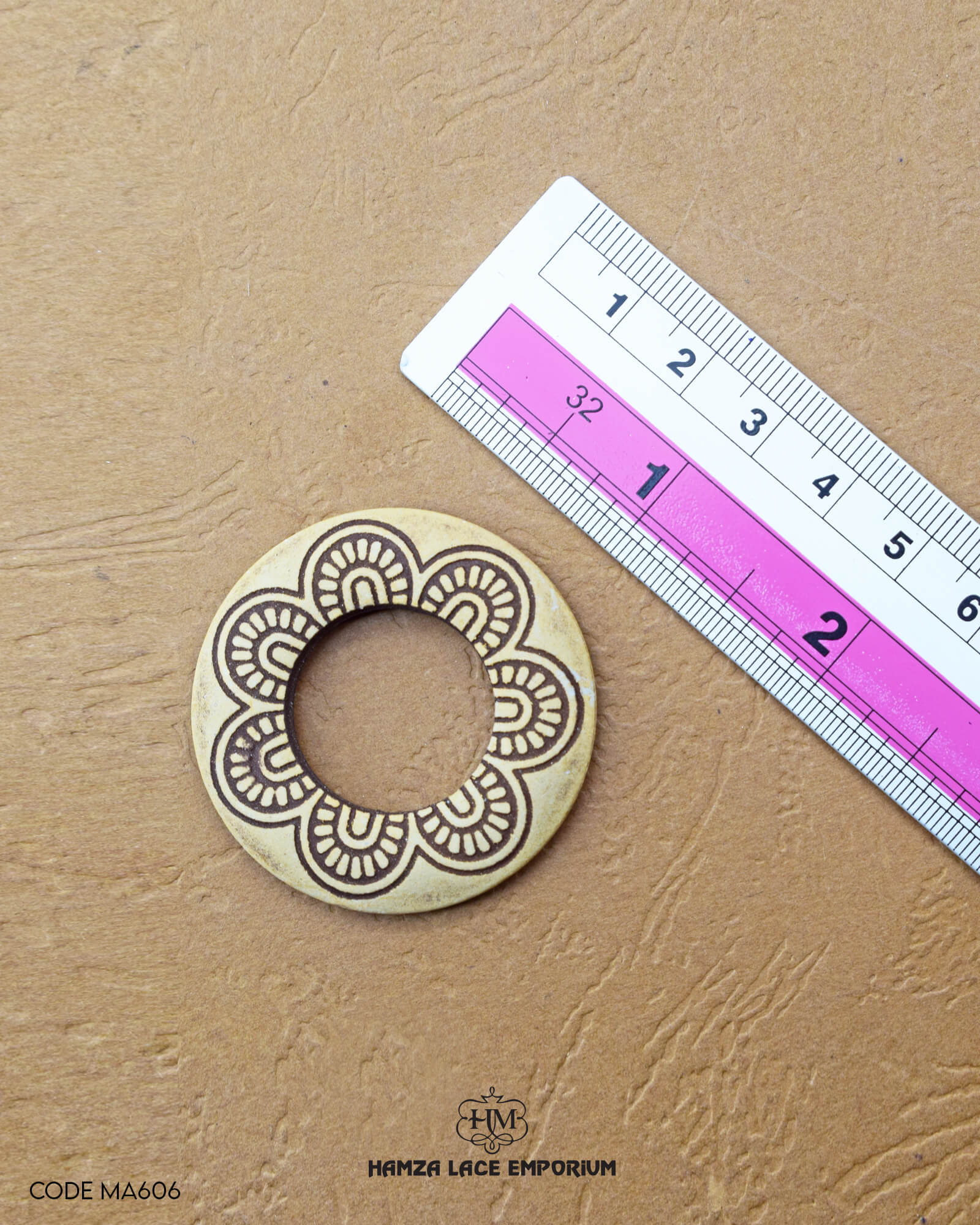 size of the 'Ring Design Button MA606' is given by using a ruler