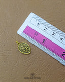 The 'Leaf Design Metal Button MA662' size is showcased using a ruler for precise measurement.