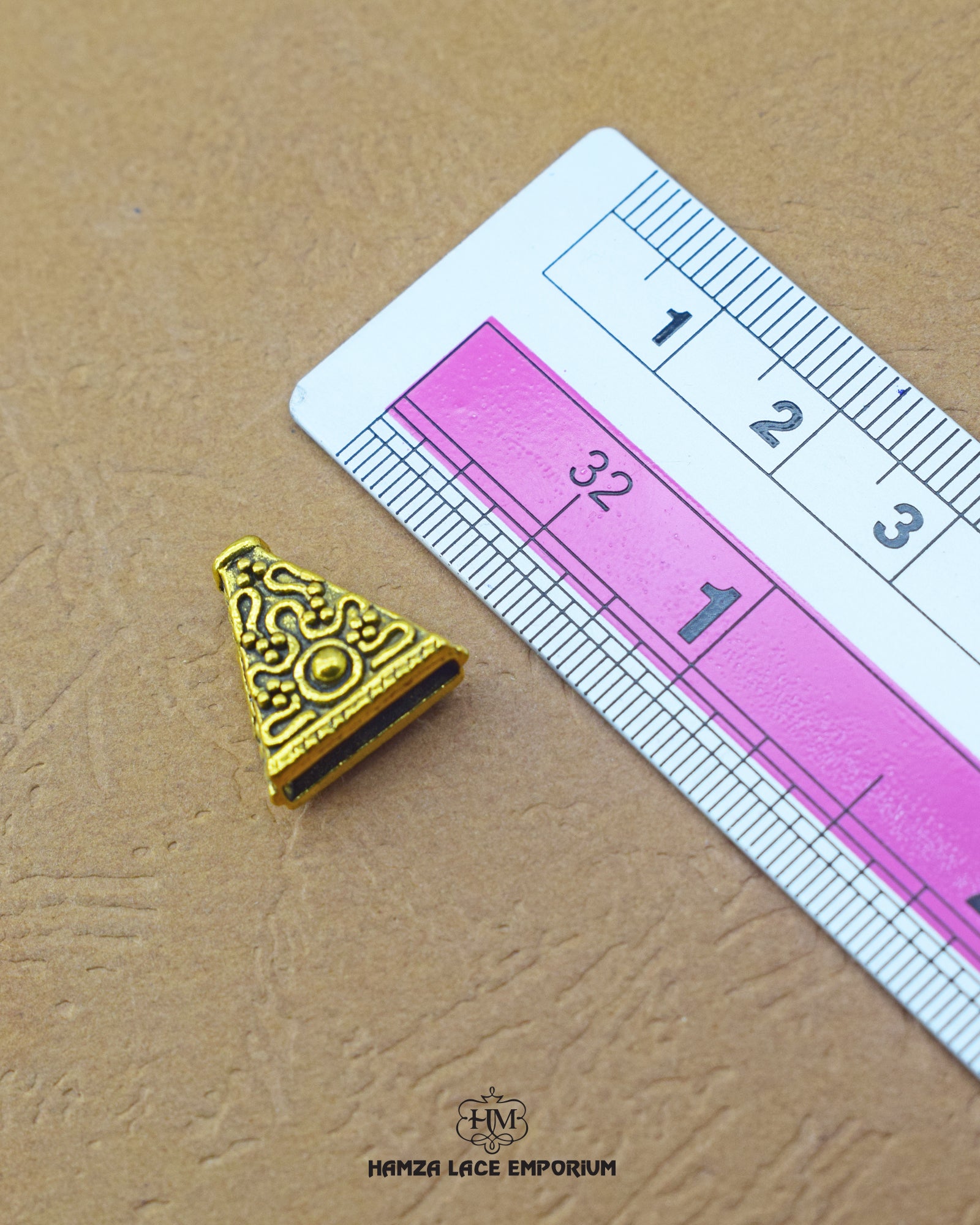 'Triangle Design Button MA664' with ruler for size reference in the product image.