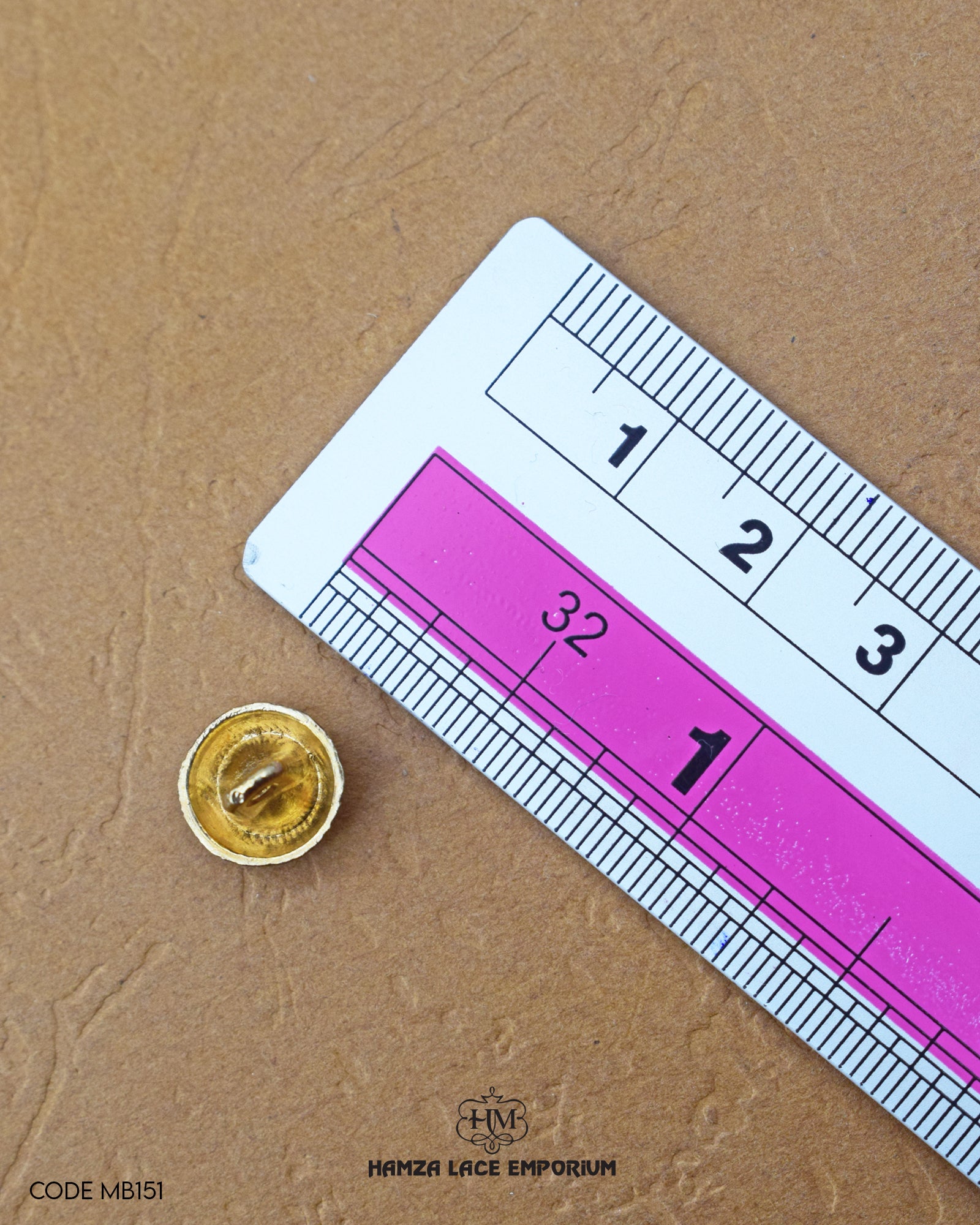 The size of the 'Metal Stone Button MB151' is measured using a ruler