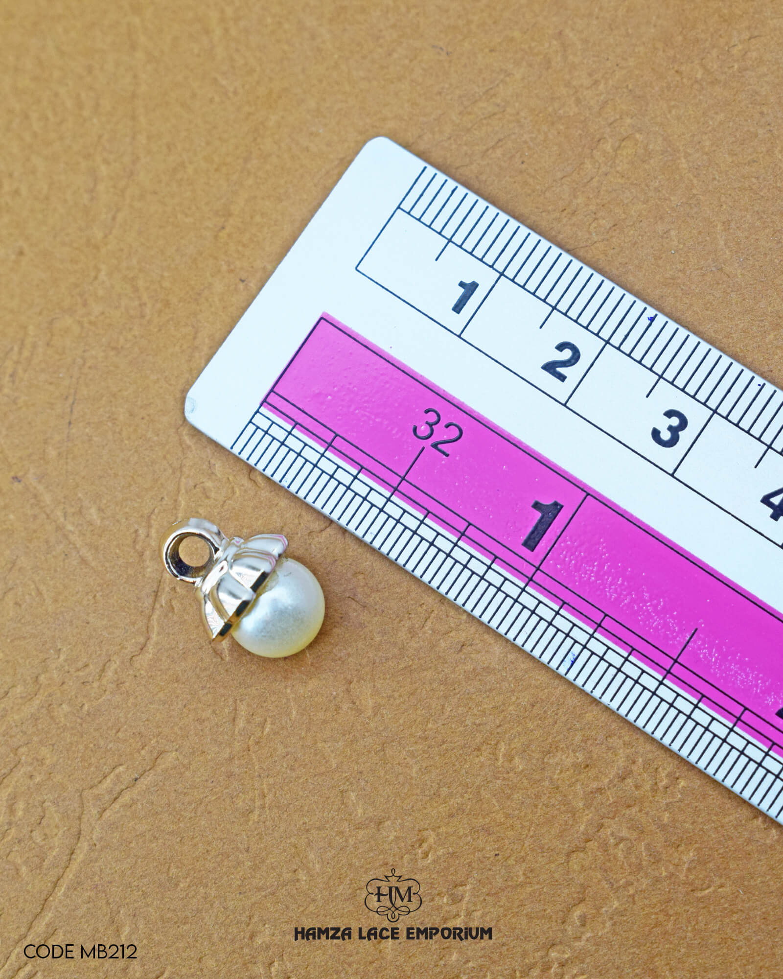 The size of the 'Pearl Plastic Button MB212' is indicated using a ruler.