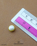 Size of the 'Metal Button MB278' is given with the help of a ruler