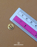 The size of the 'Four Hole Metal button MB351' is measured using a ruler.