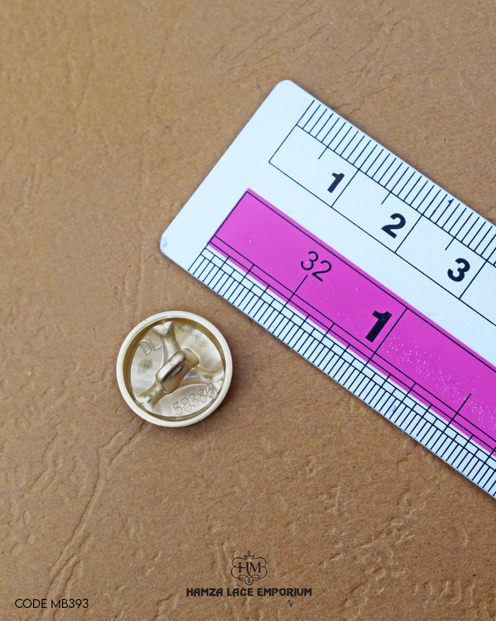Size of the 'Flower Design Metal Button MB393' is given with the help of a ruler