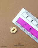 The size of the 'Metal Suiting Button MB537' is measured by using a ruler