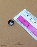 The size of the 'Metal Button MB551' is measured using a ruler.