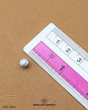 The size of the 'Metal Button MB564' is measured using a ruler.